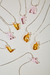o COLLAR GLASS LETTERS - comprar online