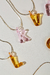 o COLLAR GLASS LETTERS - comprar online