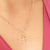 Colar delicado com cruz banhado em ouro 18k