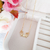 Colar com 2 meninos cravejado com zircônias banhado em ouro 18k - comprar online