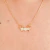 Colar com casal de filhos cravejado com zircônias banhado em ouro 18k