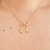 Colar mãe infinito com 2 meninos banhado em ouro 18k