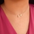 Colar fio de nylon e letra F banhado em ouro 18k
