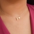 Colar fio de nylon e letra T banhado em ouro 18k
