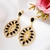 Brinco luxuoso com pedras pretas banhado em ouro 18k - comprar online