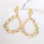 Brinco grande com gotas cristais banhado em ouro 18k na internet