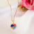 Colar com pingente de coração com símbolo do autismo banhado em ouro 18k - comprar online