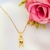 Colar com pingente de menino e coração com símbolo do autismo banhado em ouro 18k - comprar online