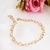 Pulseira com corrente de corações entrelaçados banhada em ouro 18k - comprar online