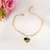 Pulseira com pingente de coração com símbolo do autismo banhado em ouro 18k - comprar online