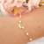 Pulseira com pingente de libélula banhada em ouro 18k