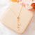 Colar gravatinha com ponto de luz e letra T banhado em ouro 18 k - comprar online