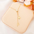 Colar gravatinha com ponto de luz e letra P banhado em ouro 18 k - comprar online