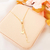 Colar gravatinha com ponto de luz e letra L banhado em ouro 18k - comprar online