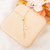 Colar gravatinha com ponto de luz e letra F banhado em ouro 18 k - comprar online