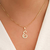 Colar com letra E banhado em ouro 18k