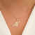 Colar com letra N banhado em ouro 18k
