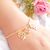 Pulseira com 2 meninos banhada em ouro 18k