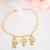 Pulseira 2 meninos e 1 menina banhada em ouro 18k - comprar online