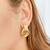 Brinco torcido banhado em ouro 18k