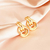 Brinco torcido banhado em ouro 18k - comprar online