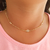 Colar infantil com pedrinhas cristais banhado em ouro 18k