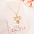 Colar com menina banhado em ouro 18k