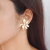 Conjunto flores banhado em ouro 18k - Lucyflá Acessórios - Semijoias Brincos, Colares, Pulseiras, anéis, tornozeleiras