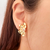 Brinco pétalas com pedra cristal banhado em ouro 18k - comprar online