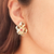 Brinco flor com miolo rosa banhado em ouro 18k - comprar online
