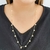 Colar longo com medalhas banhado em ouro 18k