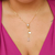 Colar gravatinha com ponto de luz e letra B banhado em ouro 18 k