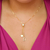 Colar gravatinha com ponto de luz e letra D banhado em ouro 18 k