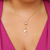 Colar gravatinha com ponto de luz e letra H banhado em ouro 18 k