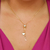 Colar gravatinha com ponto de luz e letra L banhado em ouro 18k
