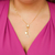 Colar gravatinha com ponto de luz e letra N banhado em ouro 18 k
