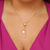 Colar gravatinha com ponto de luz e letra U banhado em ouro 18 k