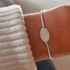 PULSERA CORBATERA OJITO