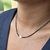 Colar de Pedras de Zircônia com Espírito Santo Mini Ródio - comprar online