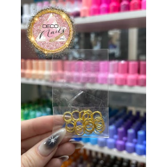 Piercing para uñas dorado 20und