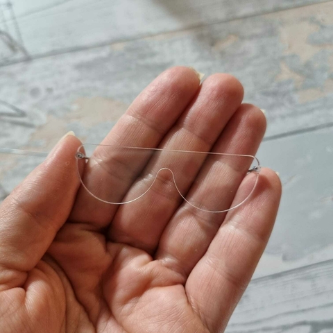Óculos meia lua transparente