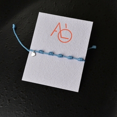 P116H Pulsera Siete Nudos Kids (Celeste)