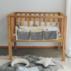 Bolsillero organizador textil de cuna