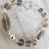 Pulsera en Plata con bolitas y cristales, cierre marinero, 20 cm.