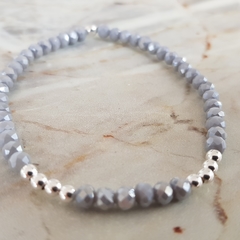 Pulsera elastizada con bolitas en Plata y cristalitos en internet