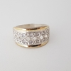 Anillo calado en Plata y Oro con Cúbic pavé