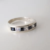 Anillo medio sin fín en Plata y Cúbic blanco y negro