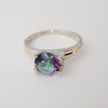 Anillo Solitario en Plata y Oro con Cubic tornasolado