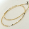 Collar con donitas beige, detalles en Plata, 45 cm.