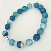 Pulsera elastizada con detalles en Plata y Piedras Ónix Cielo - comprar online